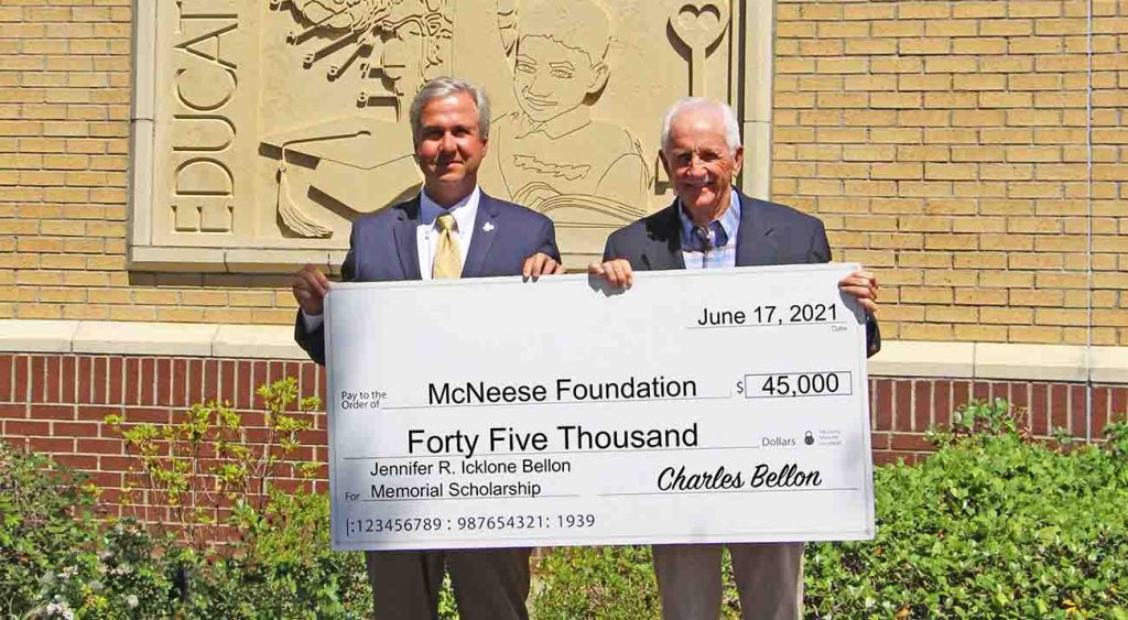 On hand for the donation are, from left, Dr. Wade Rousse, vice president for university advancement and dean of the college of business, and Bellon. McNeese Photo