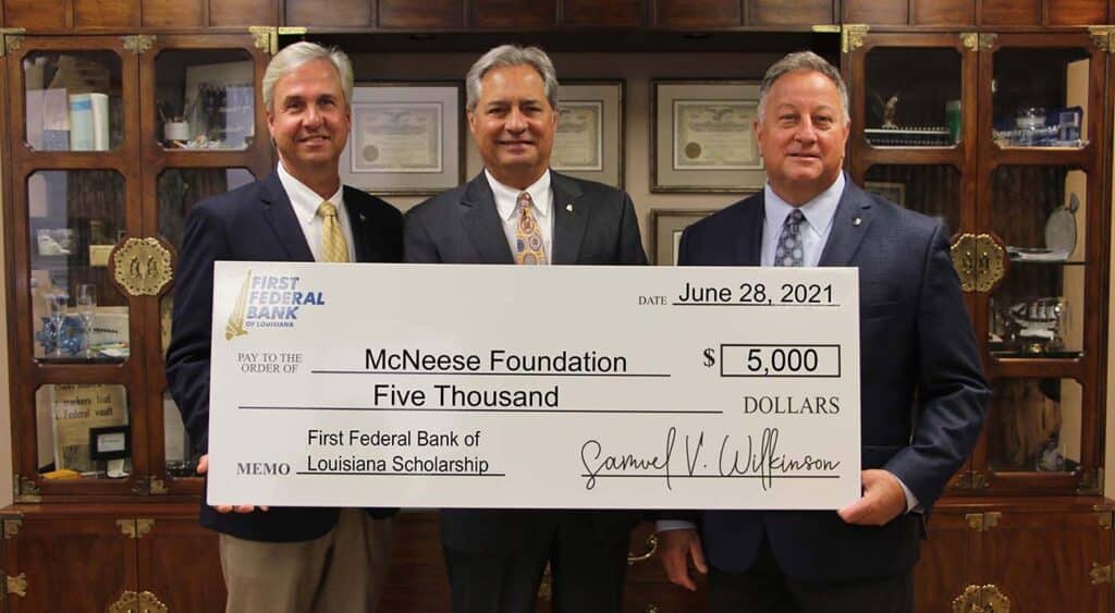 On hand for the donation are, from left, Dr. Wade Rousse, McNeese vice president for university advancement, Charles Timpa, First Federal chairman of the board and CEO, and Samuel V. Wilkinson, First Federal president. McNeese Photo