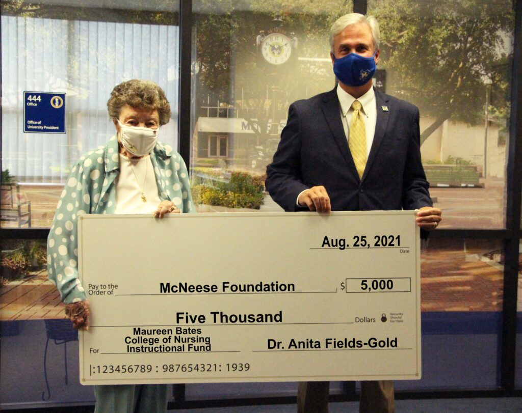 On hand for the donation are, from left, Fields-Gold and Dr. Wade Rousse, McNeese vice president for university advancement. McNeese Photo