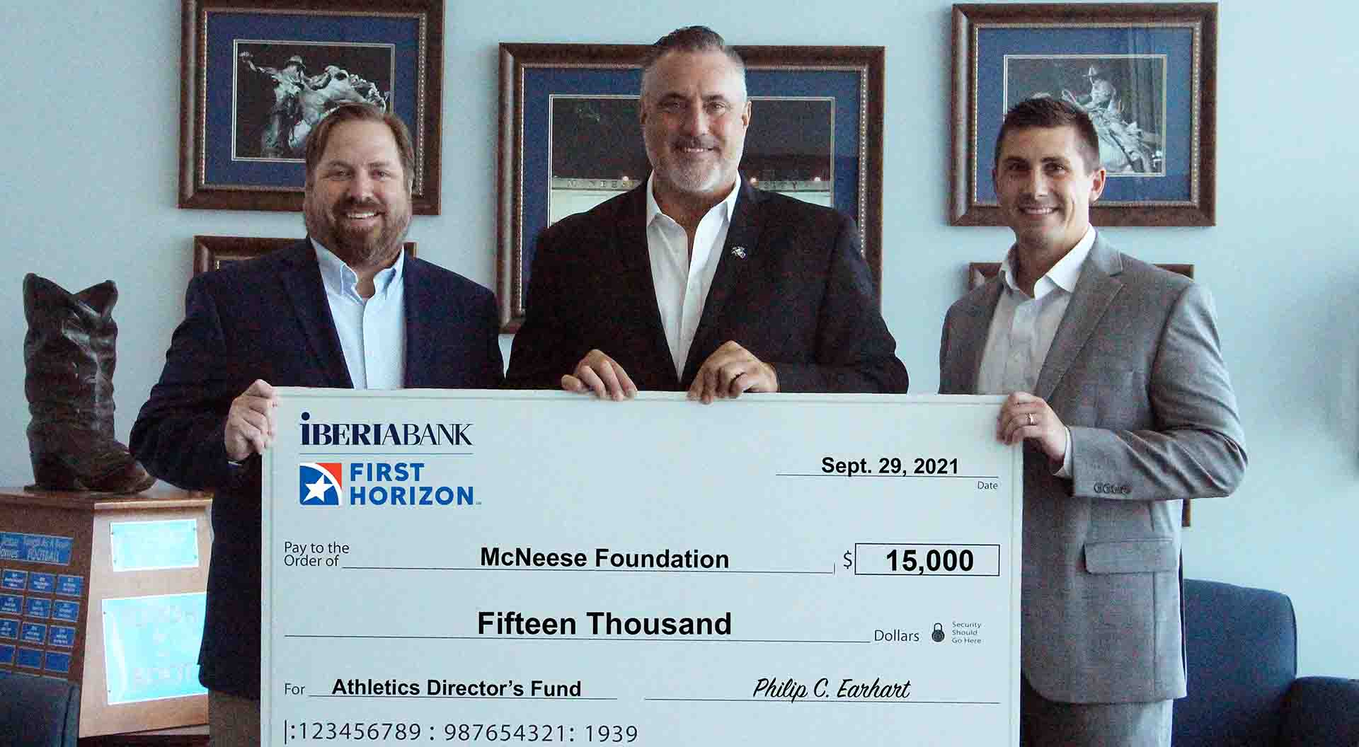 On hand for the presentation are, from left, Jason Martinez, IBERIABANK senior vice president and commercial group and retail market manager, Heath Schroyer, McNeese athletics director, and Tyler Richard, IBERIABANK commercial relationship manager. McNeese Photo