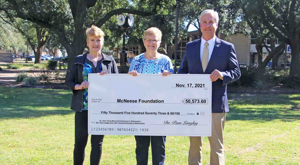 On hand for the donation are, from left, Karen Aucoin, head of the Mathematical Sciences Department, Langley and Dr. Wade Rousse, Vice President for University Advancement.