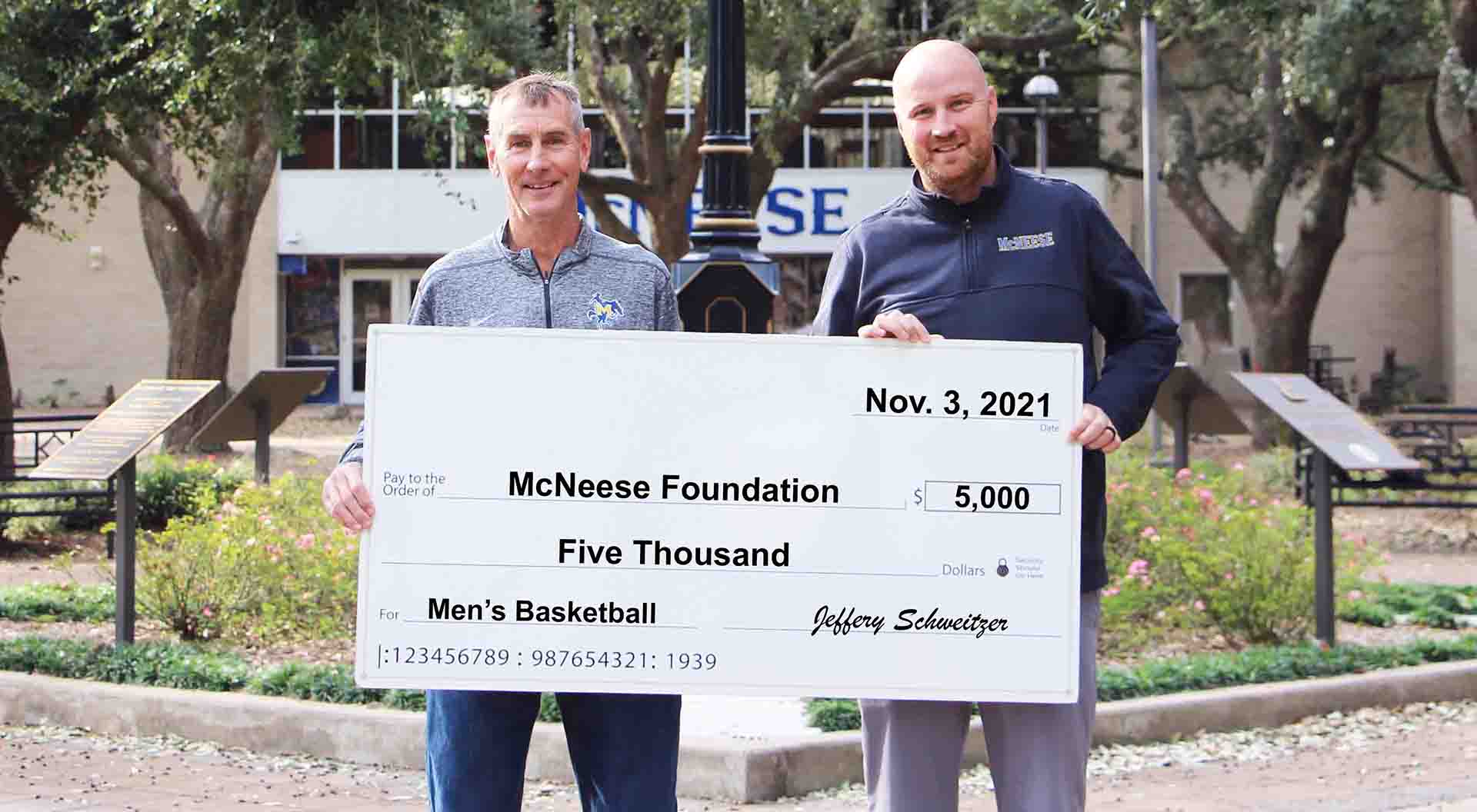 On hand for the donation are, from left, Schweitzer and John Aiken, McNeese Men’s Basketball Head Coach.