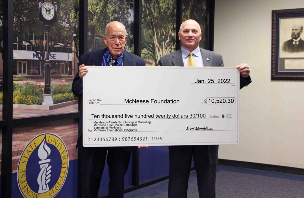 On hand for the presentation are, from left, Mendelson and Dr. Daryl Burckel, McNeese President. McNeese Photo