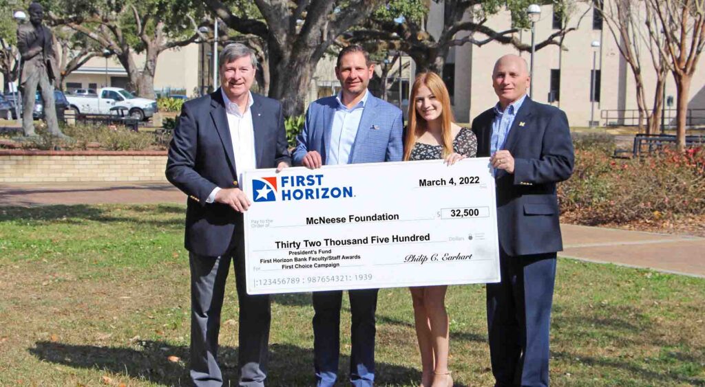 On hand for the presentation are, from left, Philip Earhart, executive vice president and Southwest Louisiana Market president, Steven Perez, senior vice president and commercial relationship manager, Alana Vincent, McNeese finance student and First Horizon Bank intern, and Dr. Daryl Burckel, McNeese president. McNeese Photo