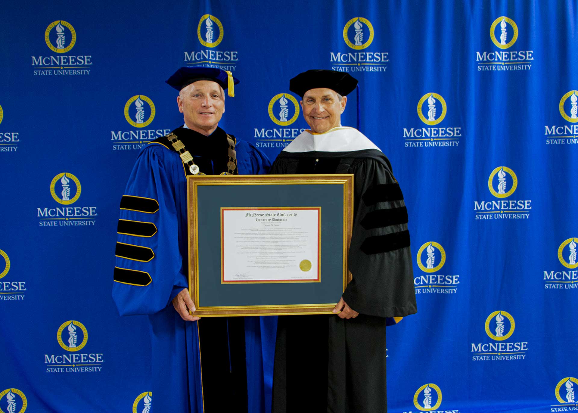 Mr. Stine is presented with honorary degree