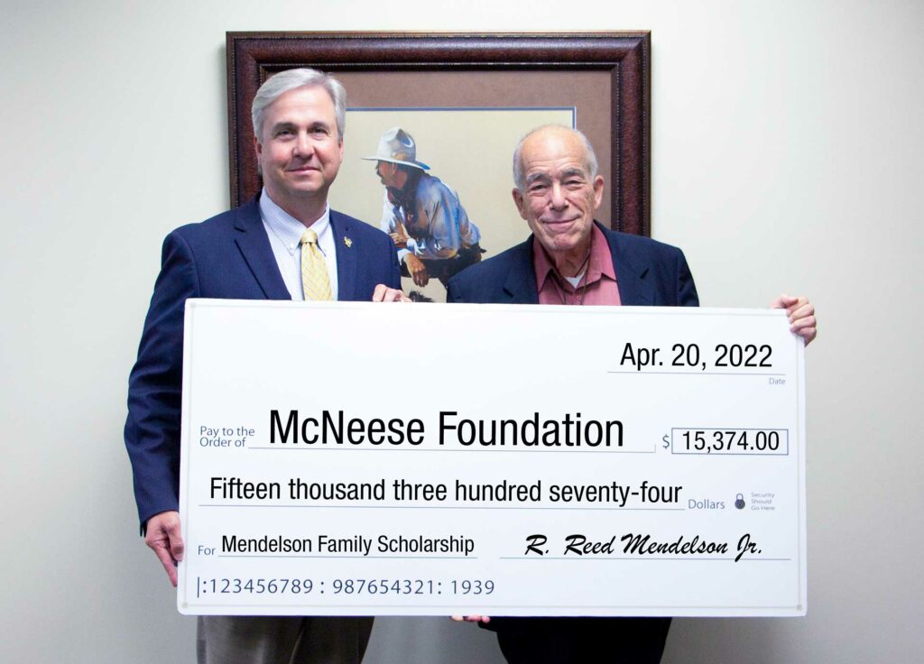 From left, Dr. Wade Rousse, McNeese vice president for university advancement, and Mendelson