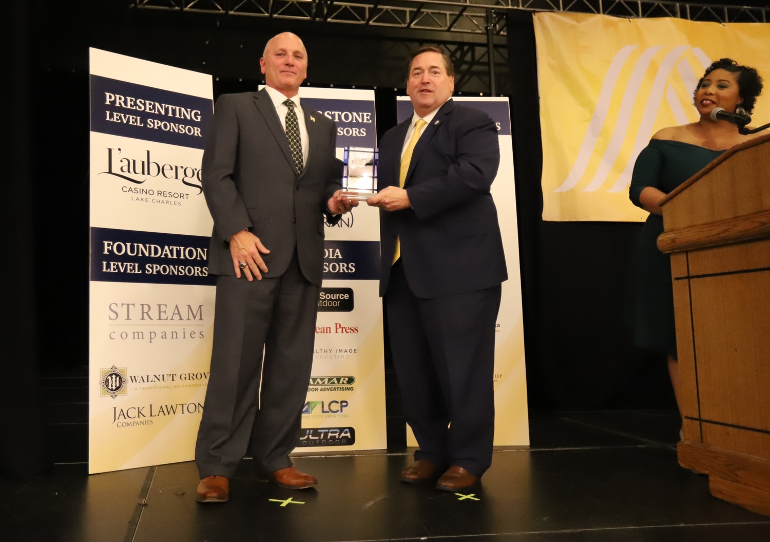 McNeese President accepts award