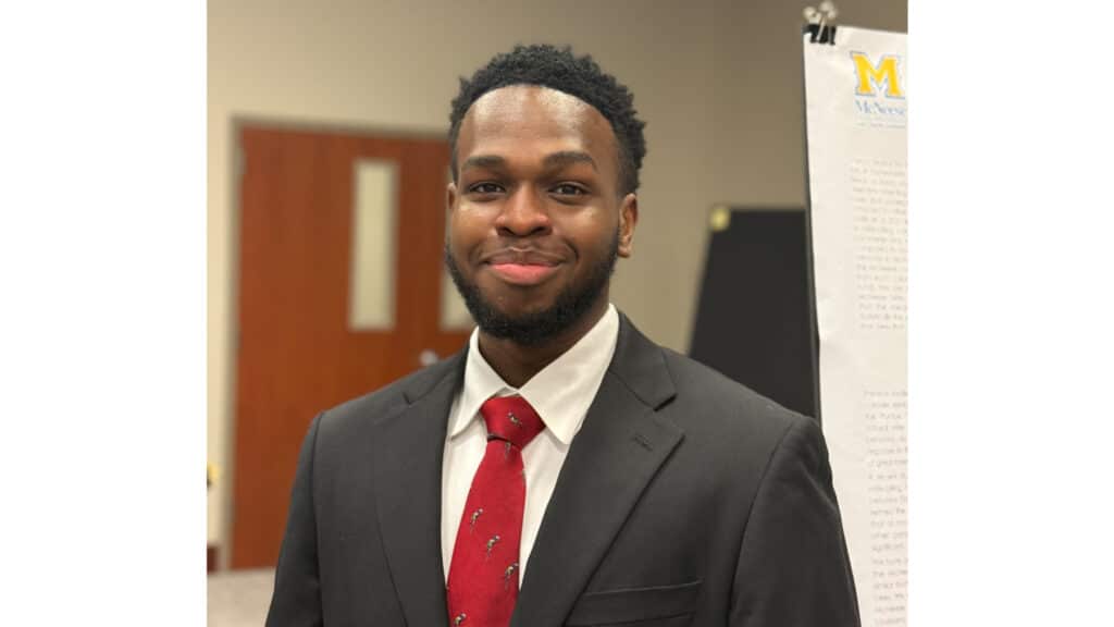 McNeese State University student works with team on an AI project.