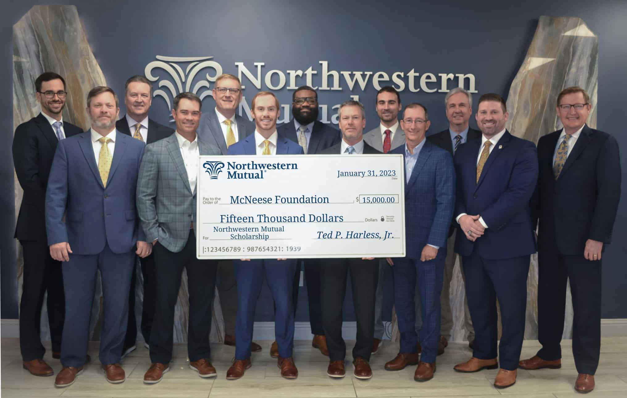 Group of men holding a $15,000 donation check for McNeese Foundation from Northwestern Mutual, January 31, 2023.