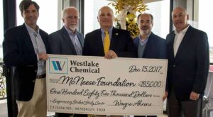 Curtis Breshcer, Wayne Ahrens, and Joe Andrepont of Westlake Chemical stand with Dr. Daryl Burckel and Dr. Nikos Kiritsis of McNeese for the check presentation.