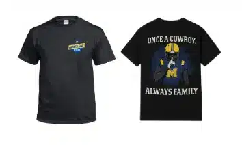 Black T-shirt featuring a sports theme with 'Once a Cowboy, Always Family' message and a football player graphic.
