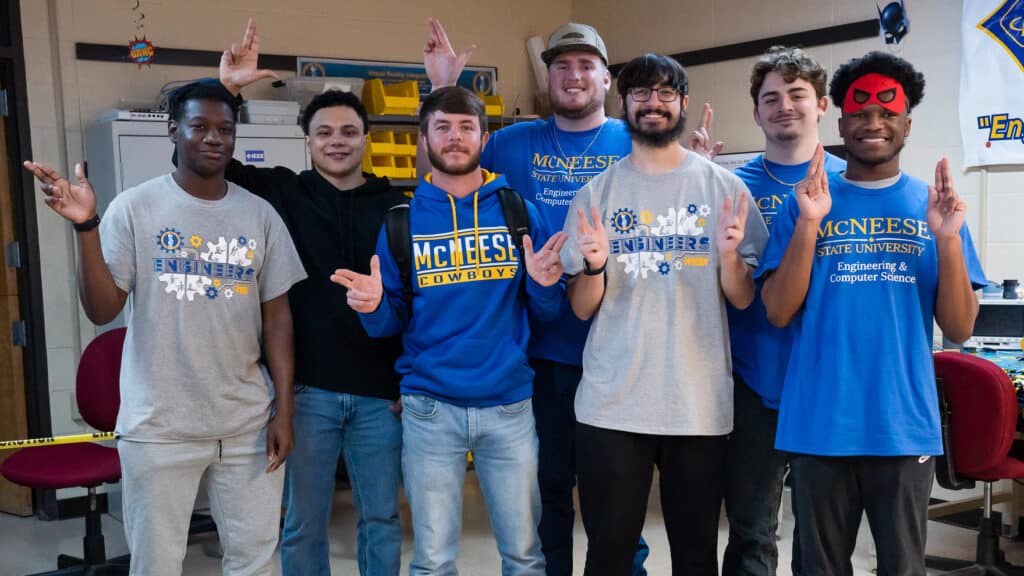 Eight McNeese State University engineering students smiling