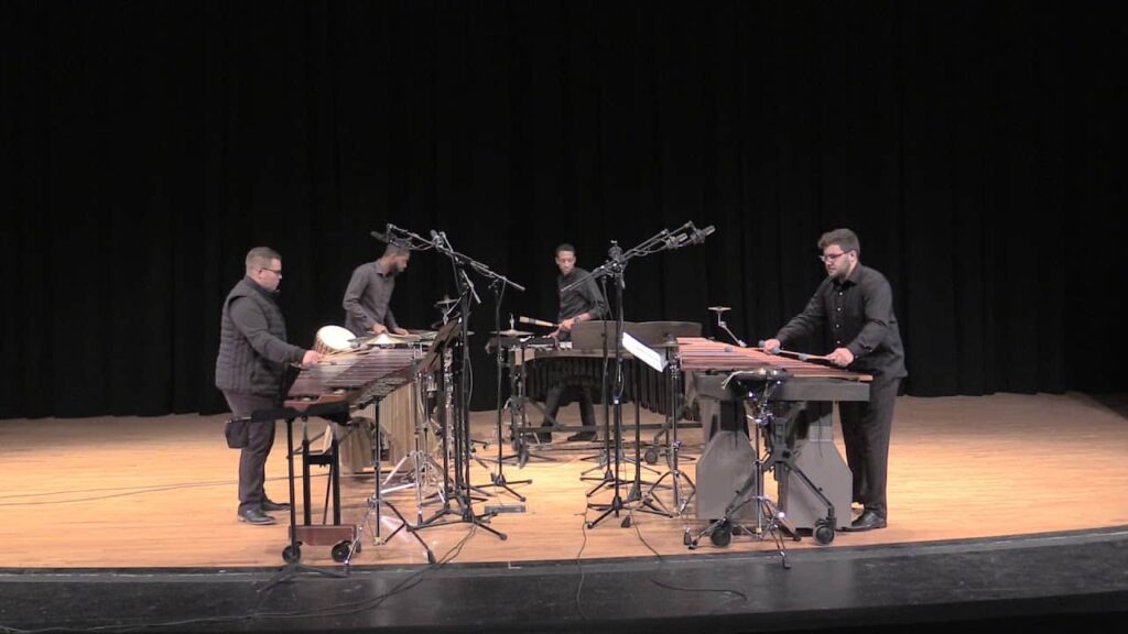 percussionists playing on stage