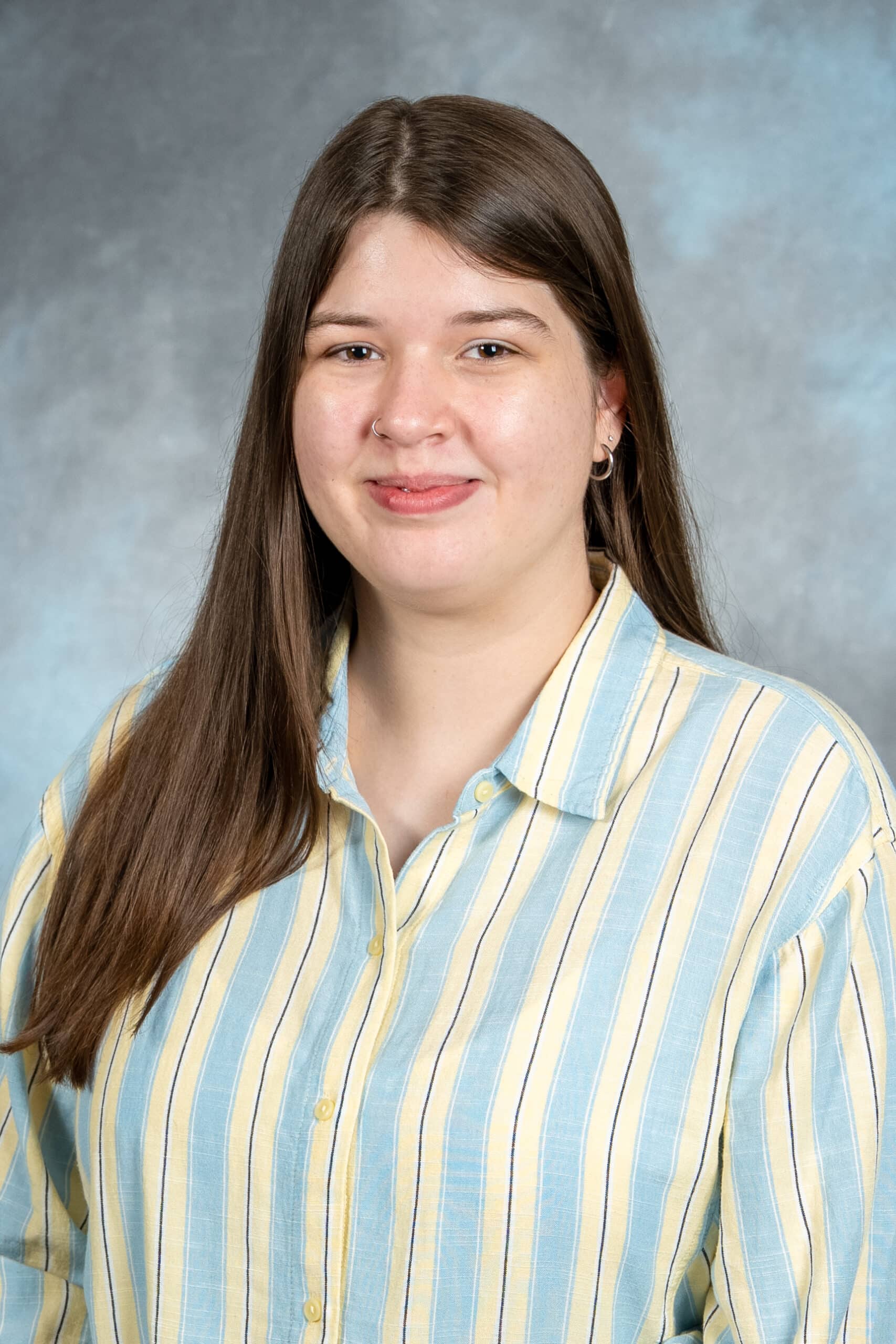 Headshot of Kalli Tharp